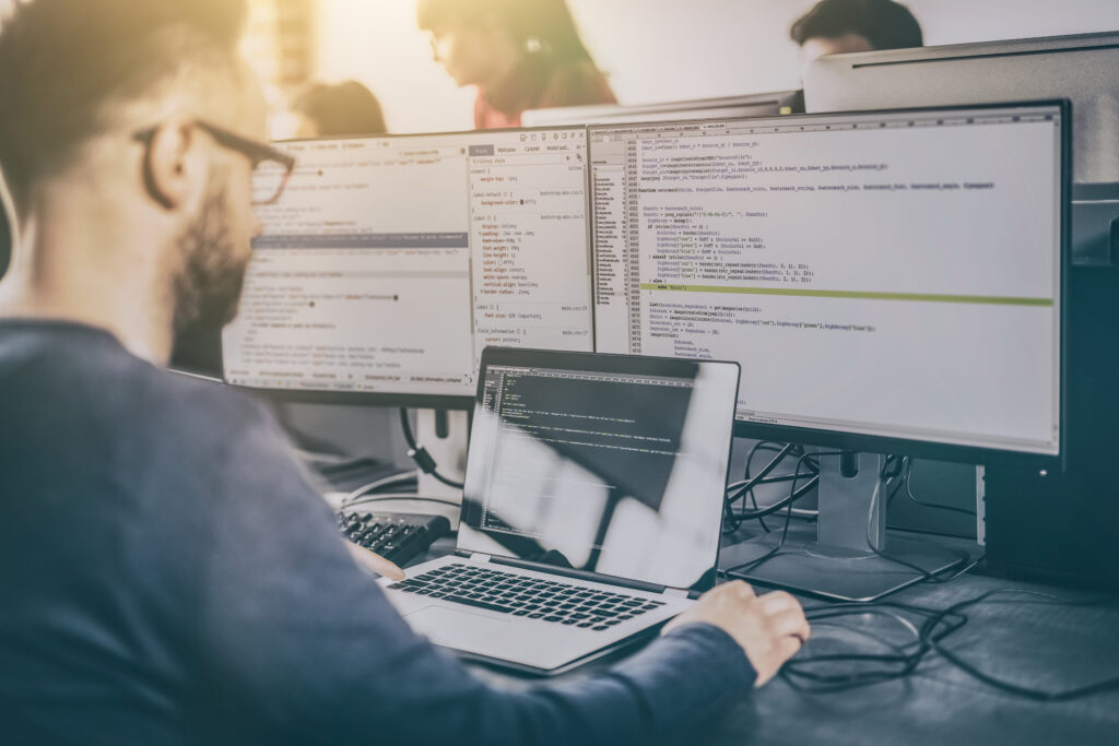 Developing,Programming,And,Coding,Technologies.,Website,Design.,Programmer,Working,In sms2go developer